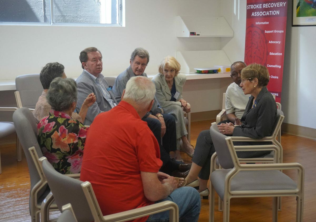 A group of people at a stroke club meeting